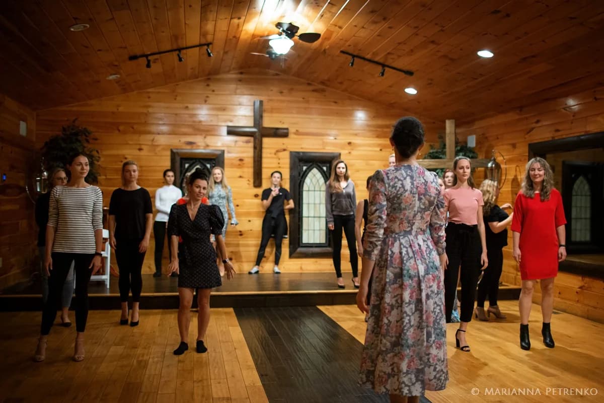 Rustic indoor wedding chapel with vaulted wood ceilings and cross at Moose Hollow Lodge in Pigeon Forge