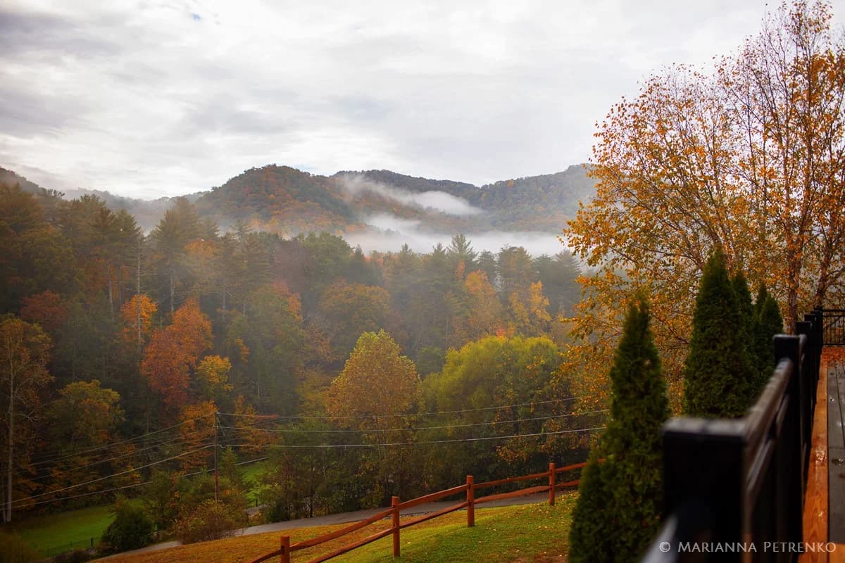 Misty autumn mountain views from the deck at Moose Hollow Lodge in Pigeon Forge near Dollywood and the Smoky Mountains