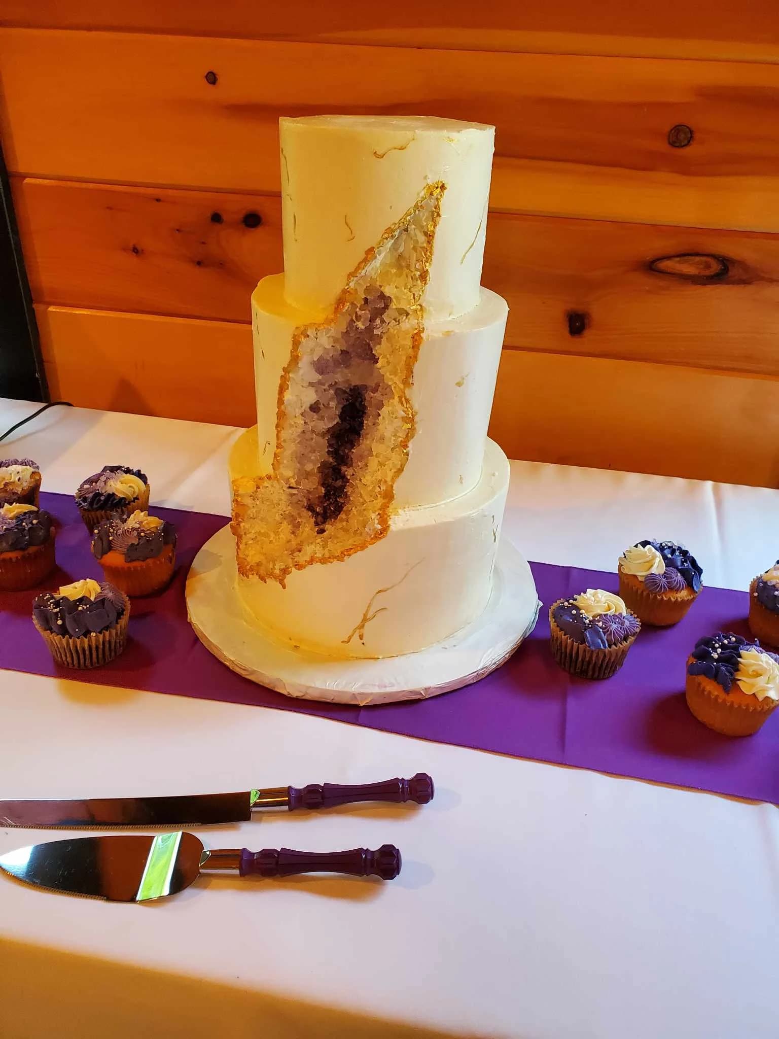 Three-tier geode wedding cake and purple cupcakes at Moose Hollow Lodge in Pigeon Forge