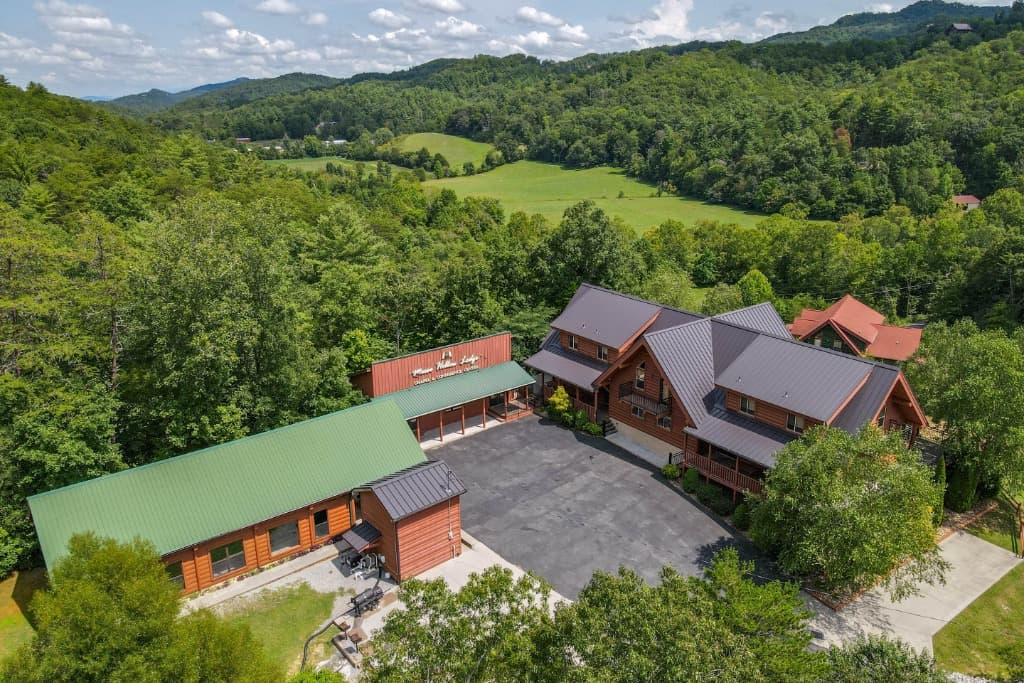 Aerial view of rustic log lodge and chapel near Smoky Mountains at Moose Hollow Lodge in Sevierville near Dollywood
