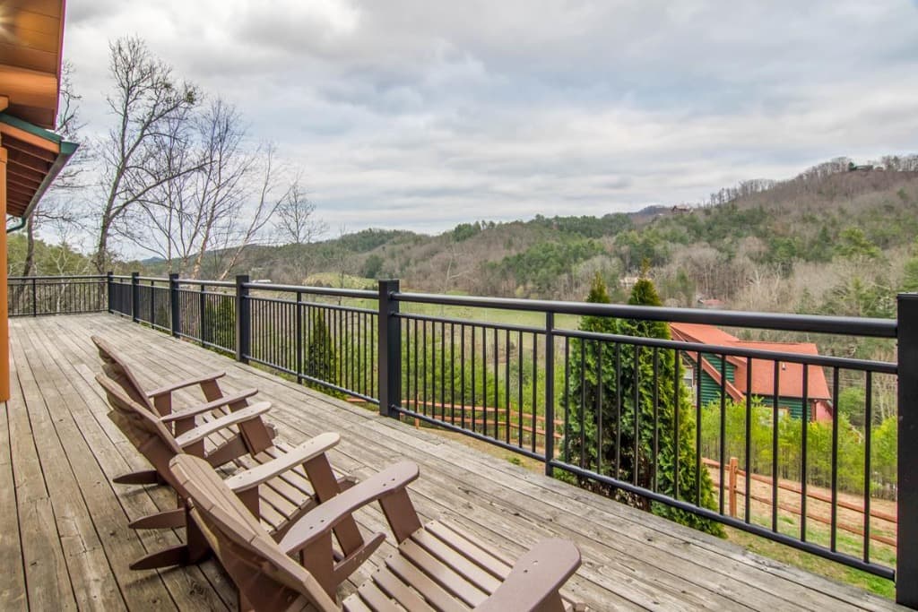 Spacious deck with Adirondack chairs and Smoky Mountains views near Dollywood at Moose Hollow Lodge in Sevierville.